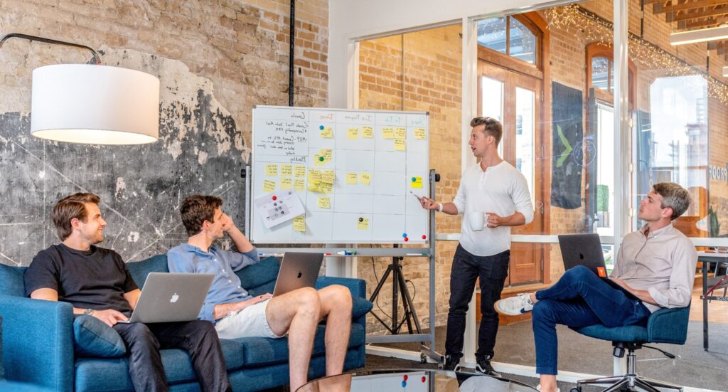 four-men-do-meeting-in-room